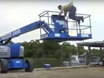 Shows a worker being ejected from the platform of a Boom Lift